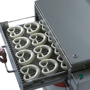 Herausnehmen, absetzen, bequem auf ein Backblech absetzen, fertig! Herausnehmen, absetzen, bequem auf ein Backblech absetzen, fertig!